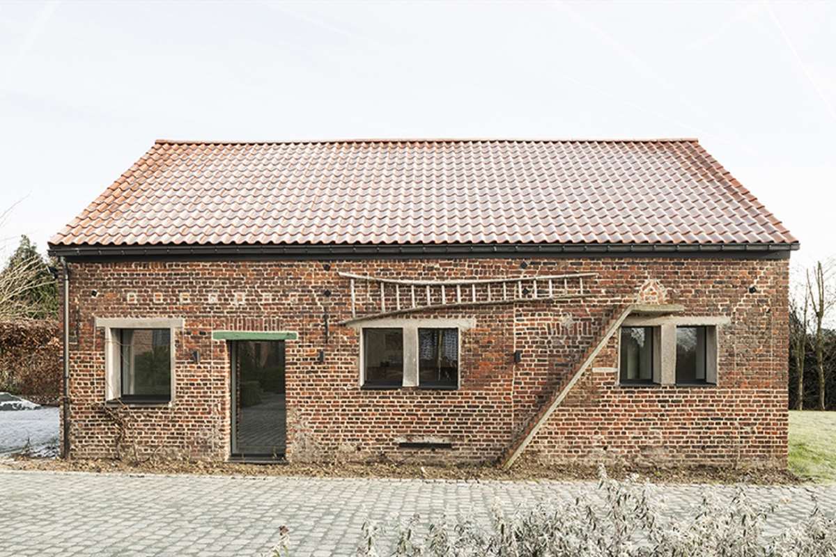 Old Barn Converted into Office with Stacked Wood Mezzanine