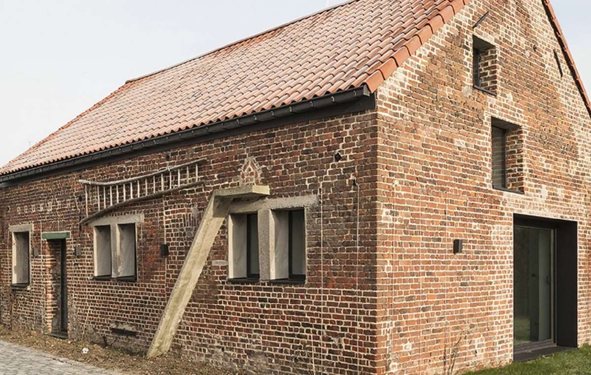 Old Barn Converted into Office with Stacked Wood Mezzanine