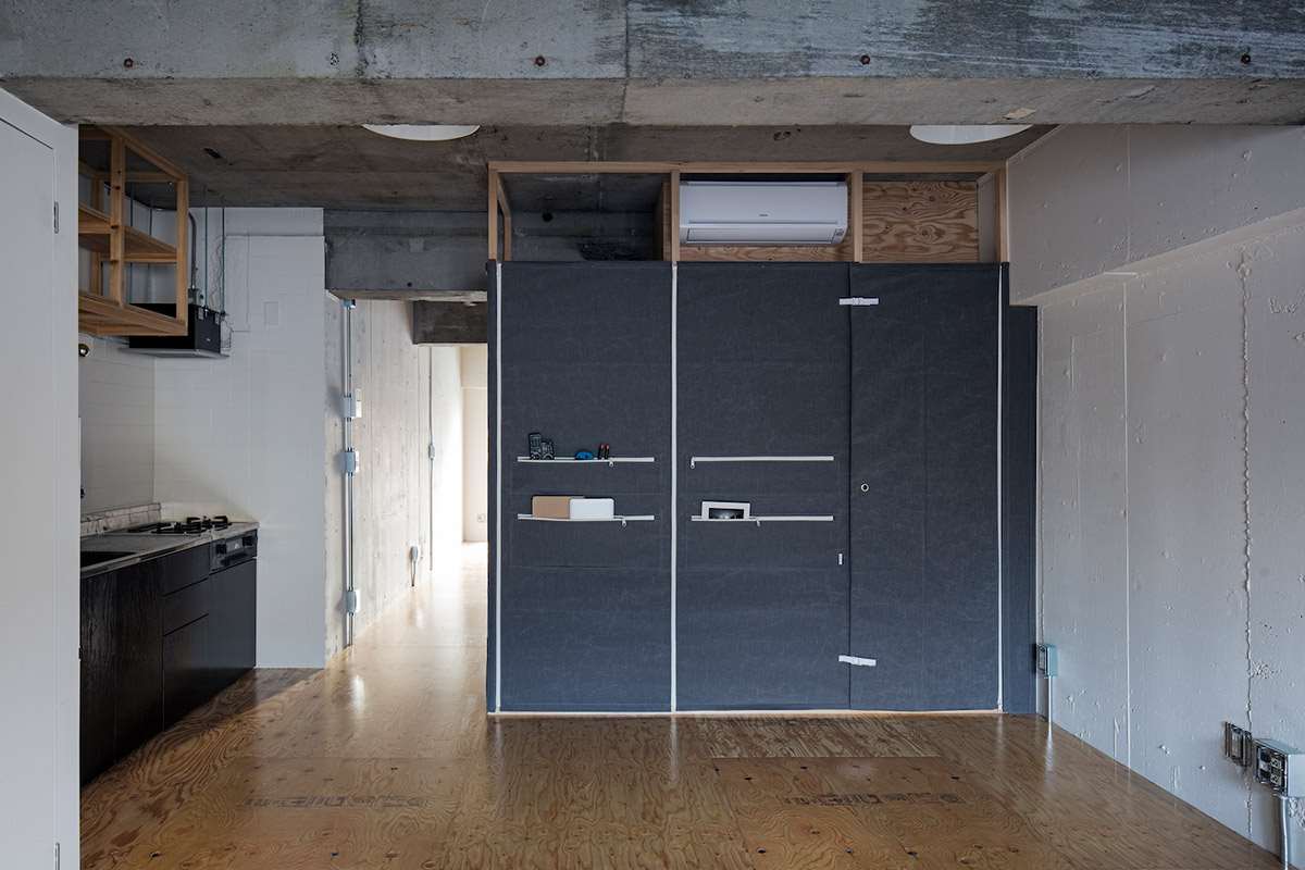 Renovated Apartment with Fabric Walls in Tokyo by Daisuke Motogi