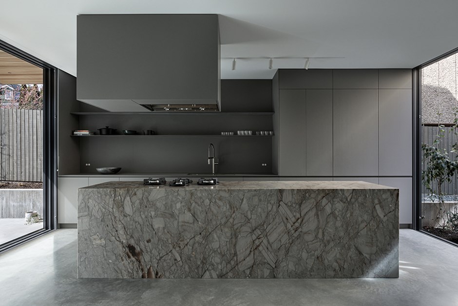 Grey Color Kitchen with Central Island Kitchen in Courtyard House by Leckie Studio Architecture + Design