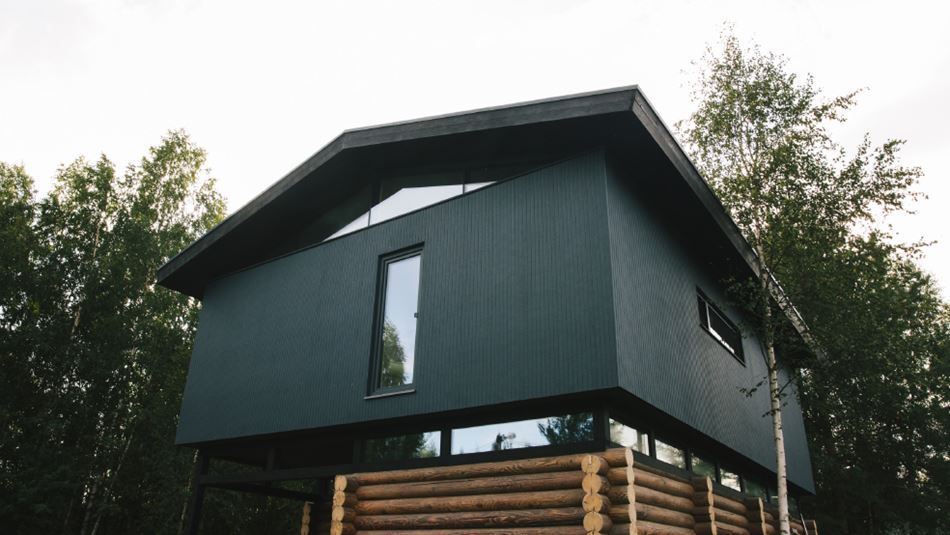 K4 Cabin - A Family Den Made of Recycled Wooden Logs