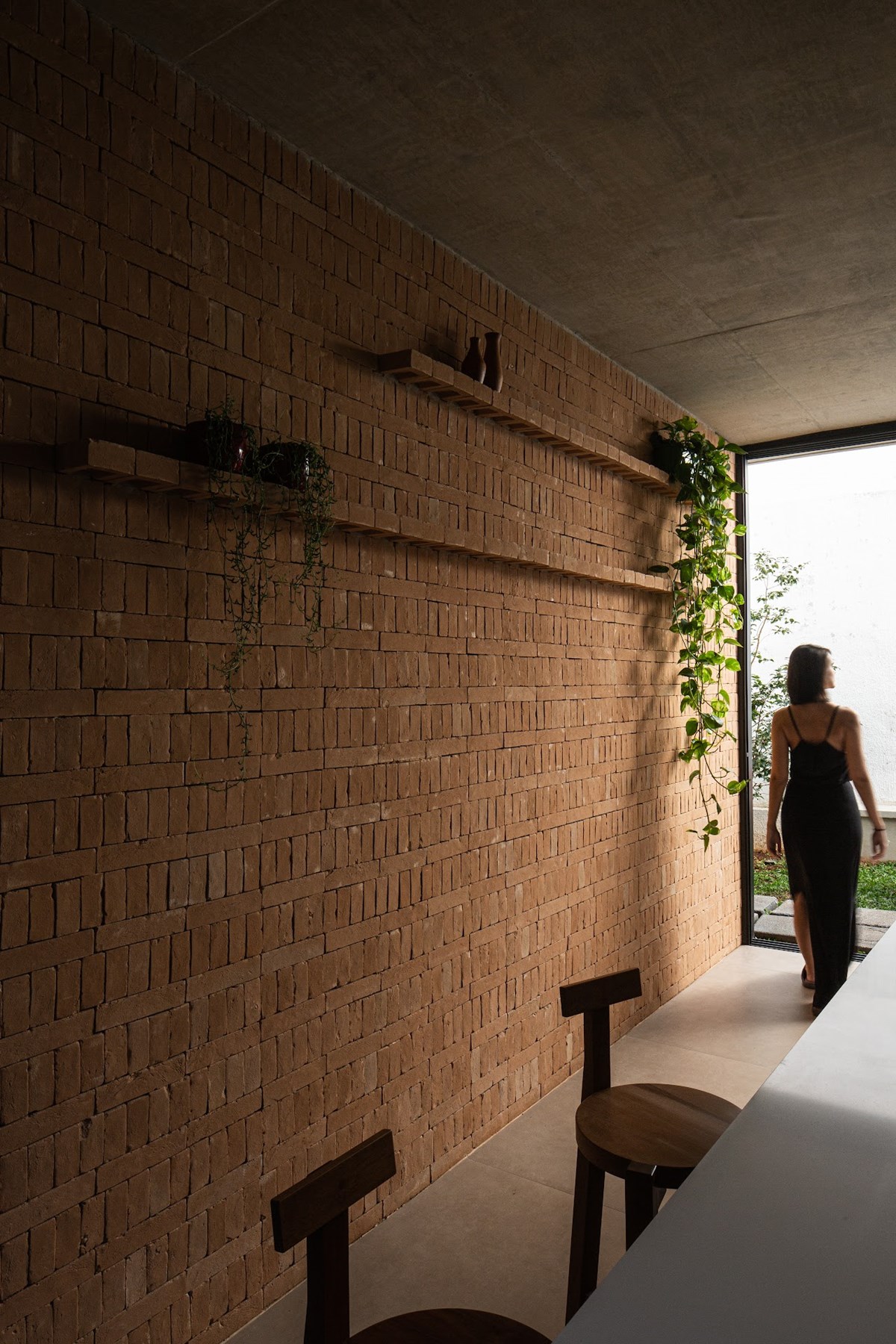 The Tangerine House by EIXO Z arquitetos
