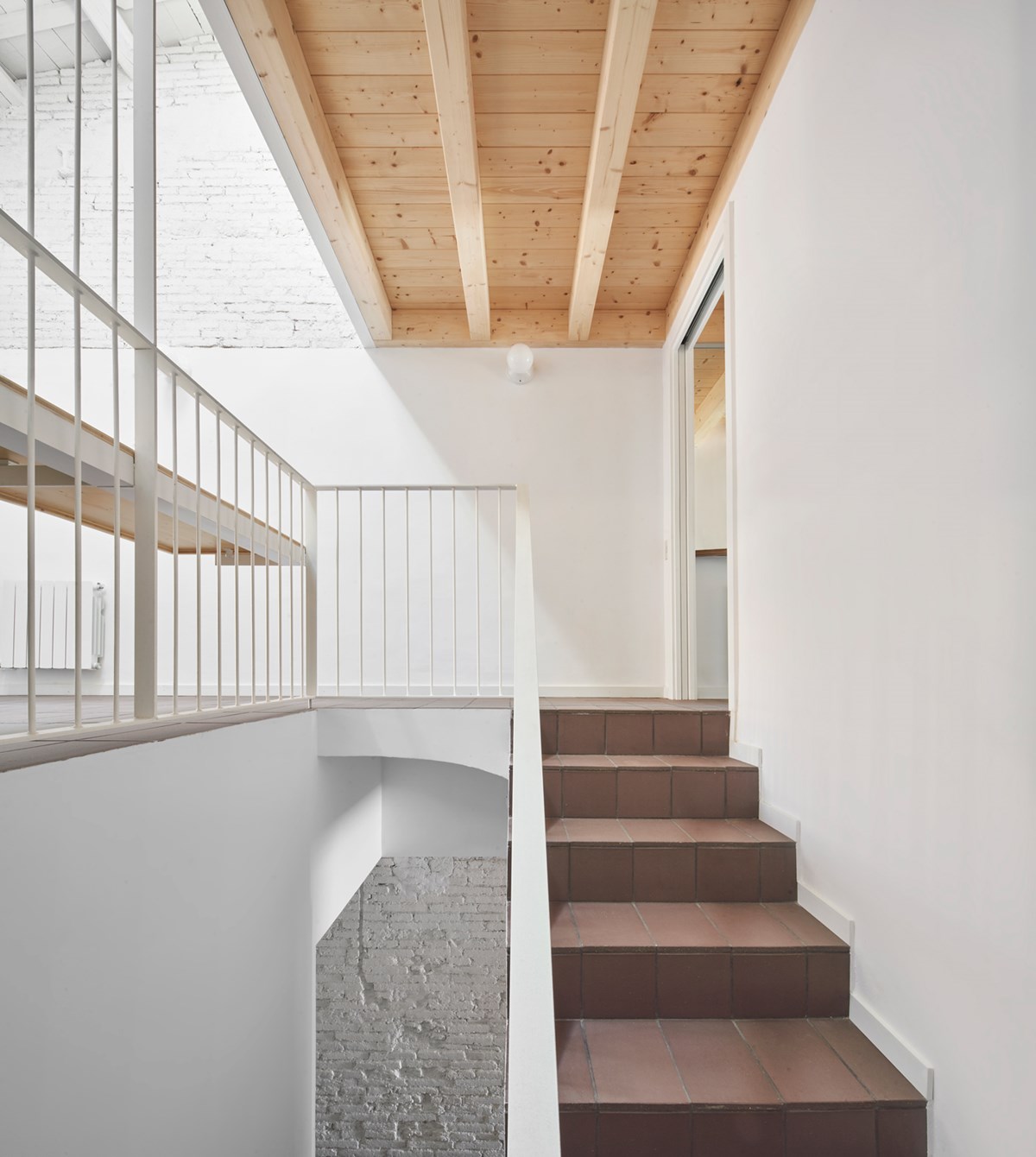 82SAN - Narrow Row House Transformed into Energy-Efficient Family Home