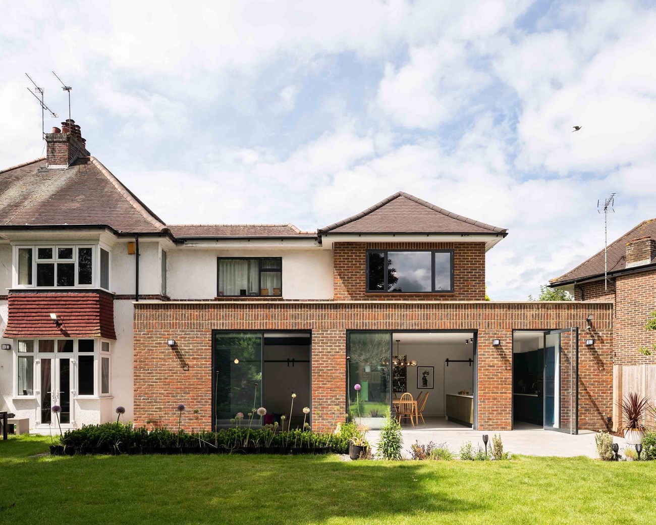 A Stylish Transformation: Raynes Park Family Home Renovation by Studio Bua